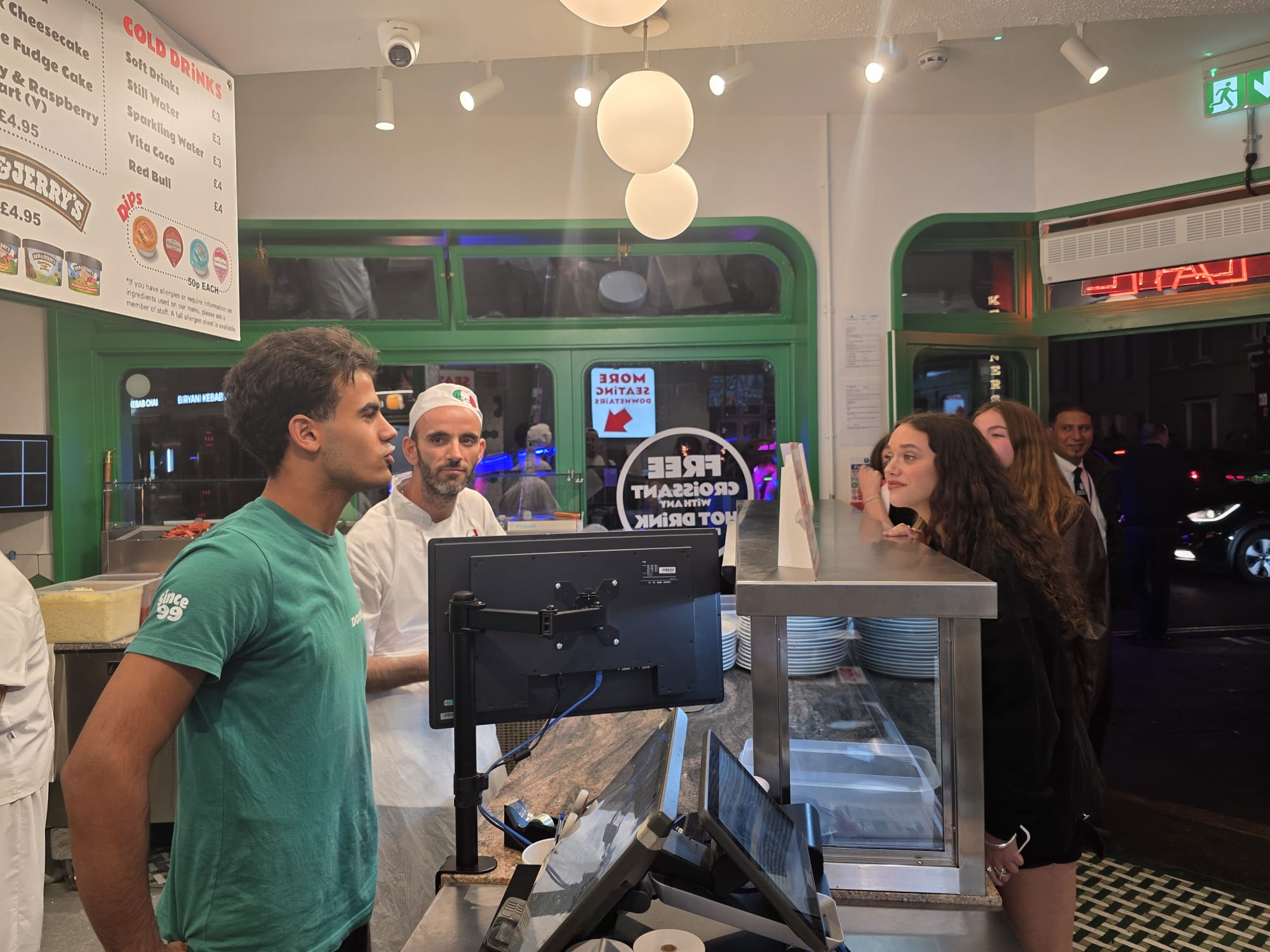 icco staff taking orders from the customer at the counter
